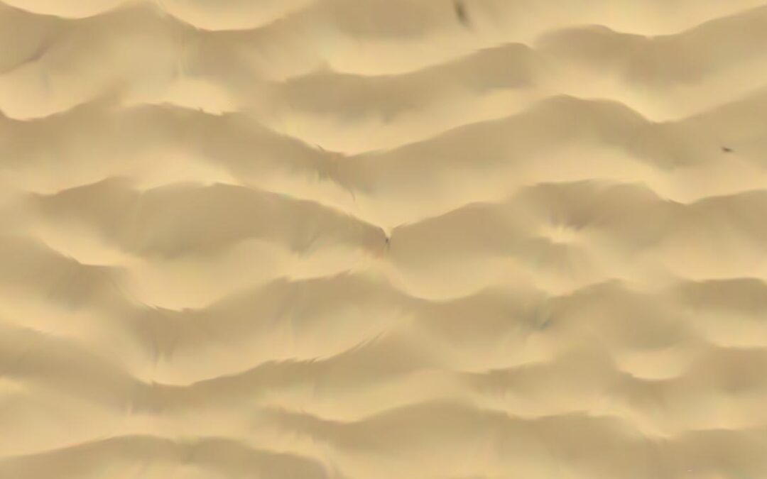 Skryf met jou tone in die sand